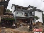 图为杨英家正在建设的新房。　张丹 摄 - 云南频道