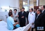 近平同老挝人民革命党中央委员会总书记、国家主席本扬一道出席玛霍索综合医院奠基仪式 - 人力资源和社会保障厅